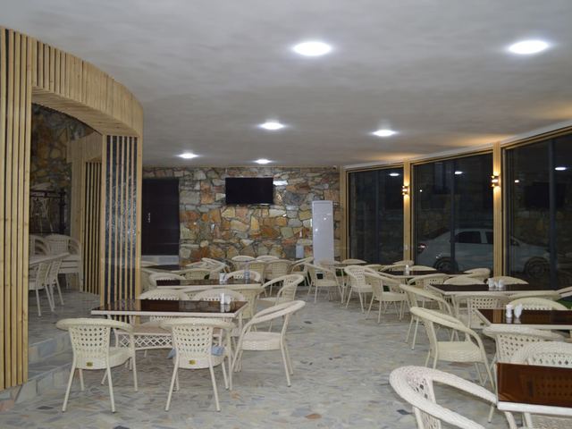 Tables and chairs set out inside the dining hall